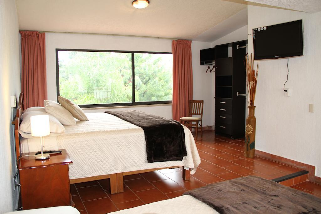Hotel Quinta Del Sol Tepoztlán Habitación foto